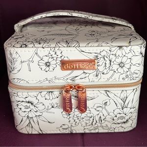 Doterra oil case holds 12 bottles and 8 roll on slots